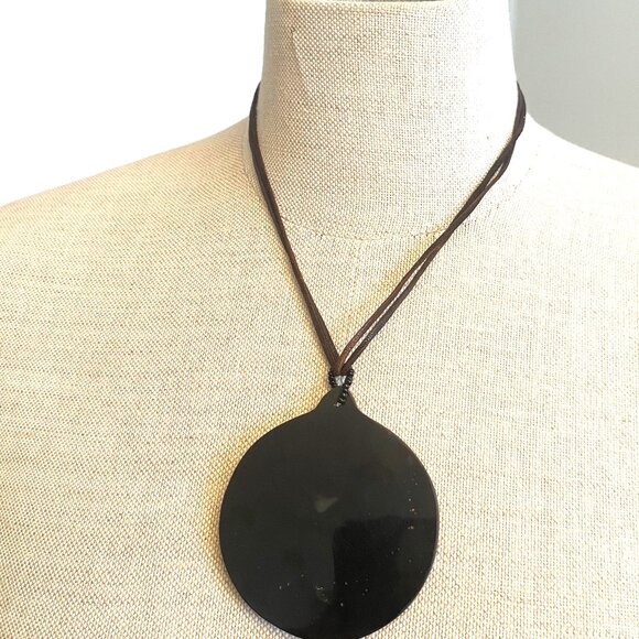 Black Circular Pendant With Inlaid Cubes on a Black Strand Necklace - Picture 4 of 5